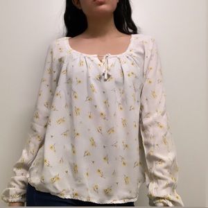 White mesh like blouse with yellow flowers